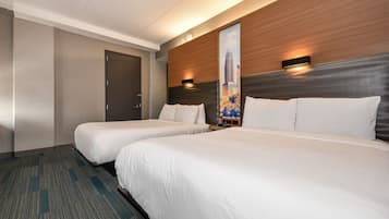 Hypo-allergenic bedding, desk, laptop workspace, blackout curtains
