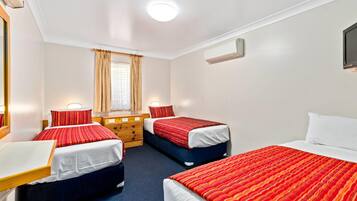 Deluxe Family Room | 1 bedroom, desk, blackout drapes, iron/ironing board