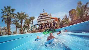 Slide into fun at this tropical resort, where a modern building and lush surroundings create the perfect setting for a relaxing getaway.