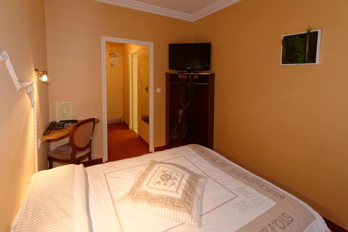 Desk, blackout drapes, soundproofing, iron/ironing board (on request)