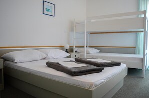 Down duvets, pillow-top beds, in-room safe, blackout curtains