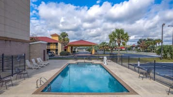 Seasonal outdoor pool, pool loungers