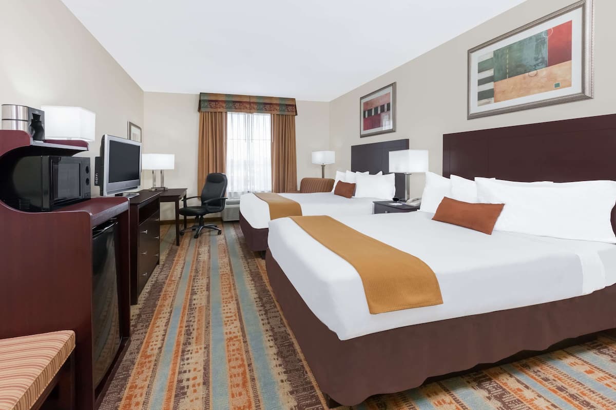 Standard Room, 2 Queen Beds | Desk, iron/ironing board, free cots/infant beds, free WiFi