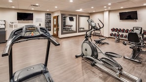 A gym with treadmills, elliptical machines, and weight machines. - Best Western Plus Champaign/Urbana Inn (Champaign)