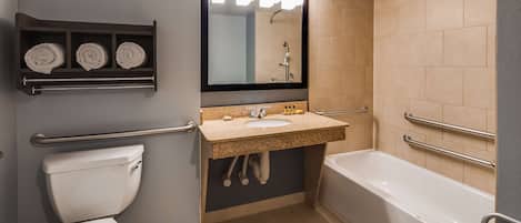 Combined shower/tub, designer toiletries, hair dryer, towels