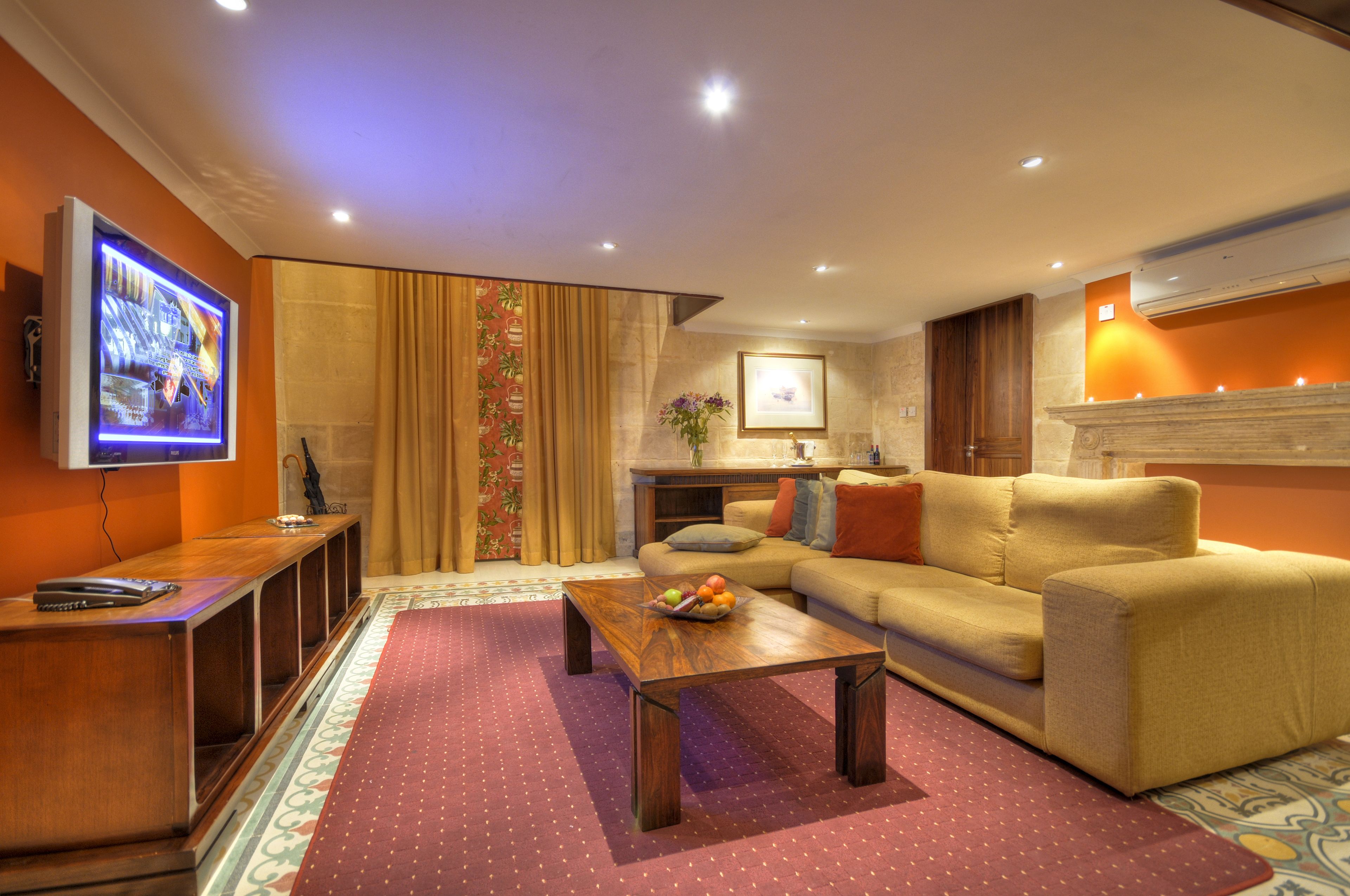 superior suite | living room | 42-inch lcd tv with satellite channels, tv