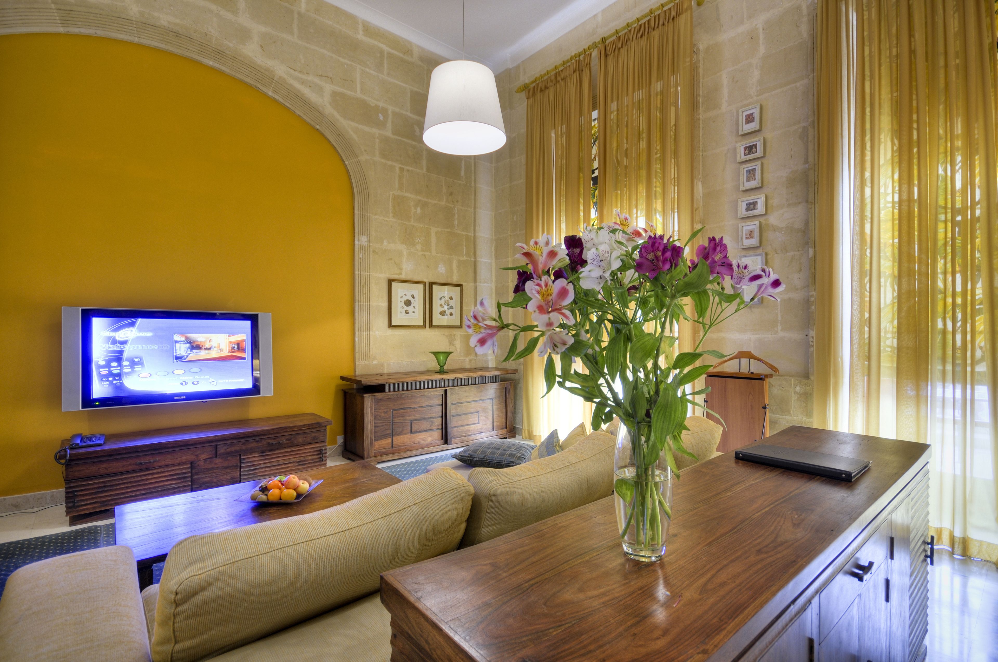 superior suite | living room | 42-inch lcd tv with satellite channels, tv