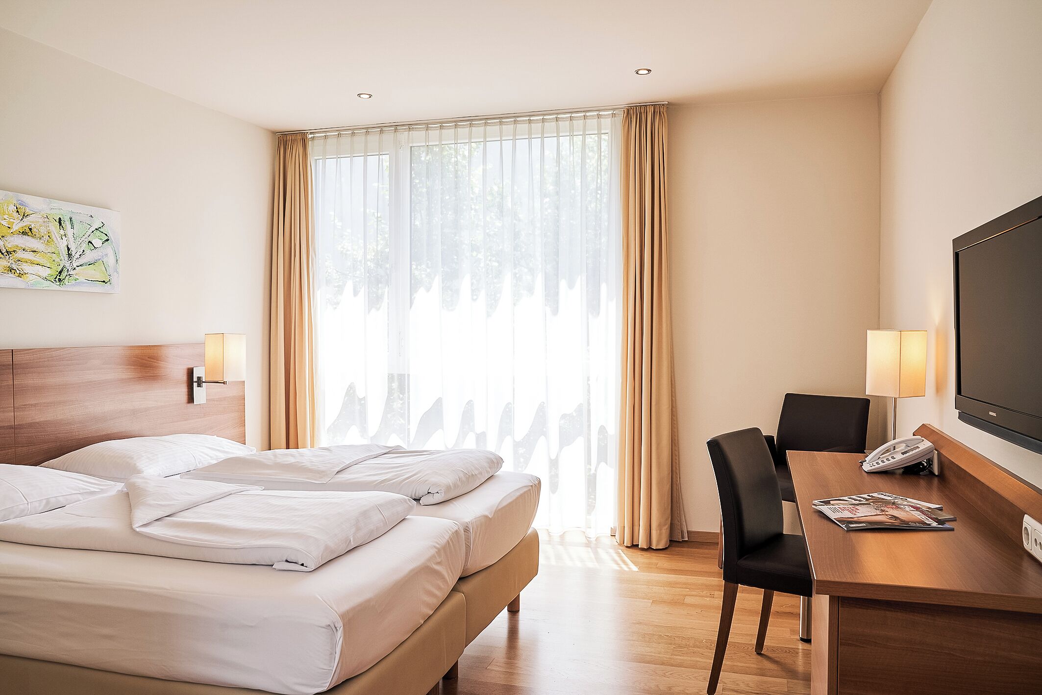 Hypo-allergenic bedding, in-room safe, desk, laptop workspace