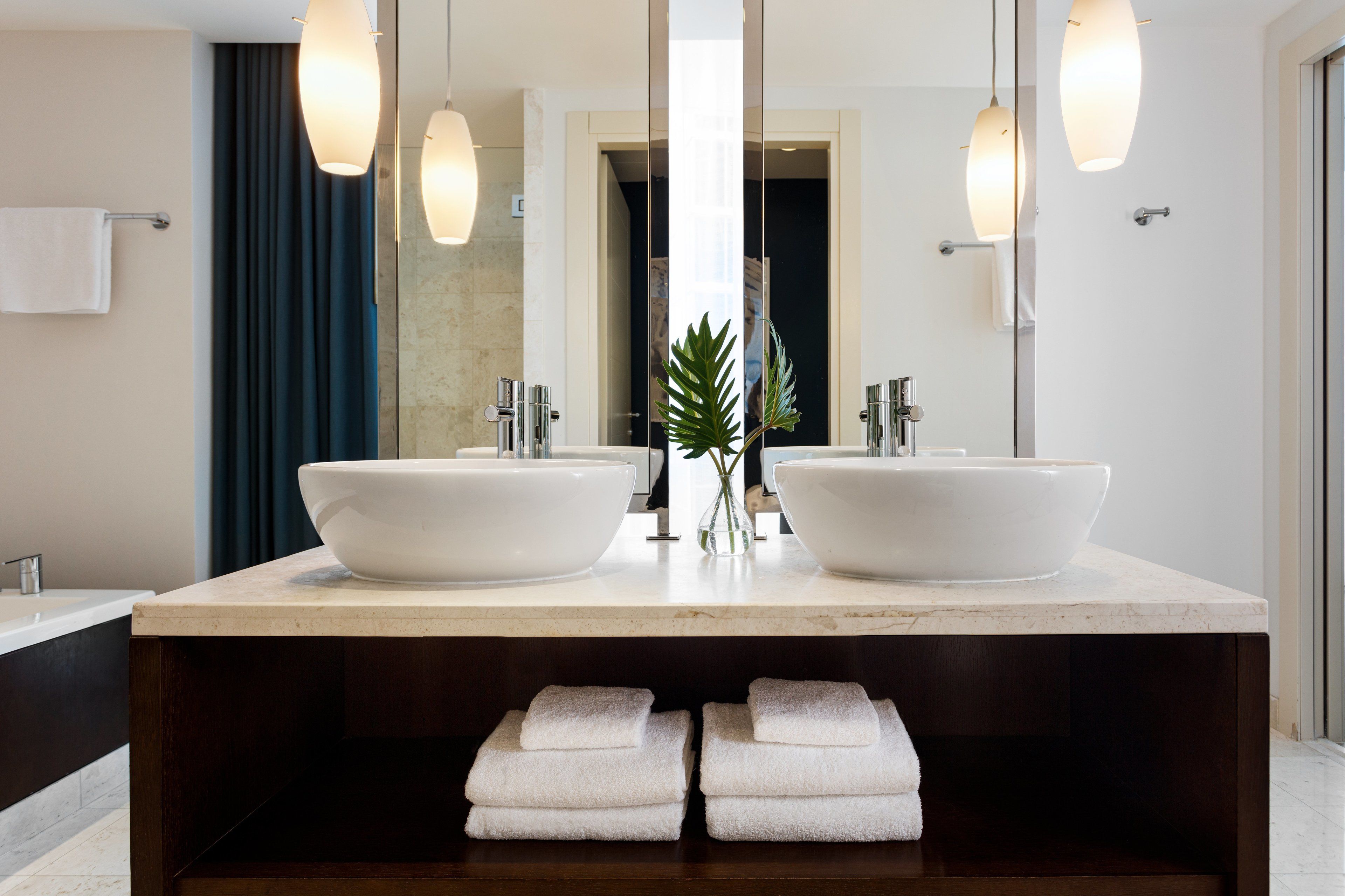 separate bathtub and shower, deep-soaking bathtub, rainfall showerhead