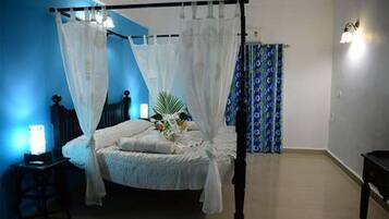 Indulgence Suite Room | Premium bedding, down comforters, minibar, individually decorated