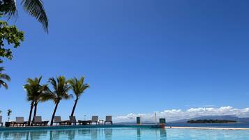 Outdoor pool, pool umbrellas, sun loungers