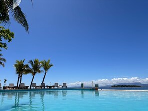 Outdoor pool, pool umbrellas, pool loungers