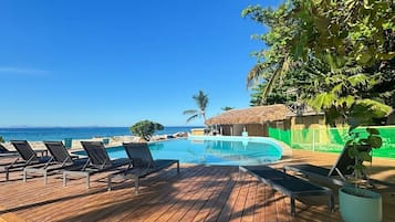 Outdoor pool, pool umbrellas, sun loungers