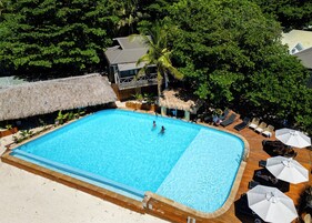 Outdoor pool, pool umbrellas, sun loungers