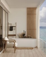 Deluxe Ocean View Spa King Room | In-room safe, individually decorated, individually furnished, bed sheets