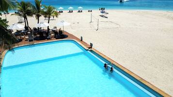 Outdoor pool, pool umbrellas, sun loungers