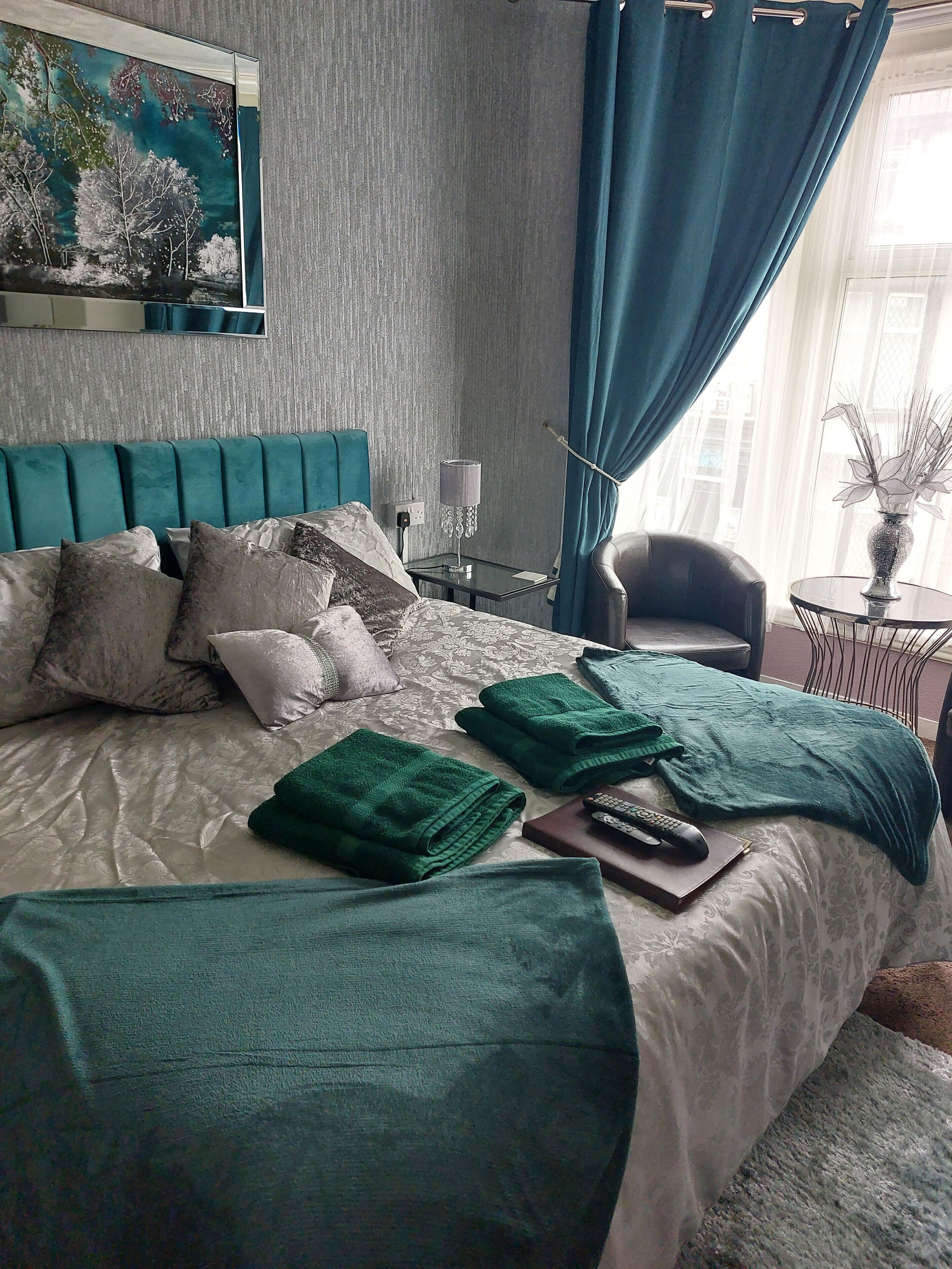 room 3 | laptop workspace, blackout curtains, iron/ironing board, travel cot