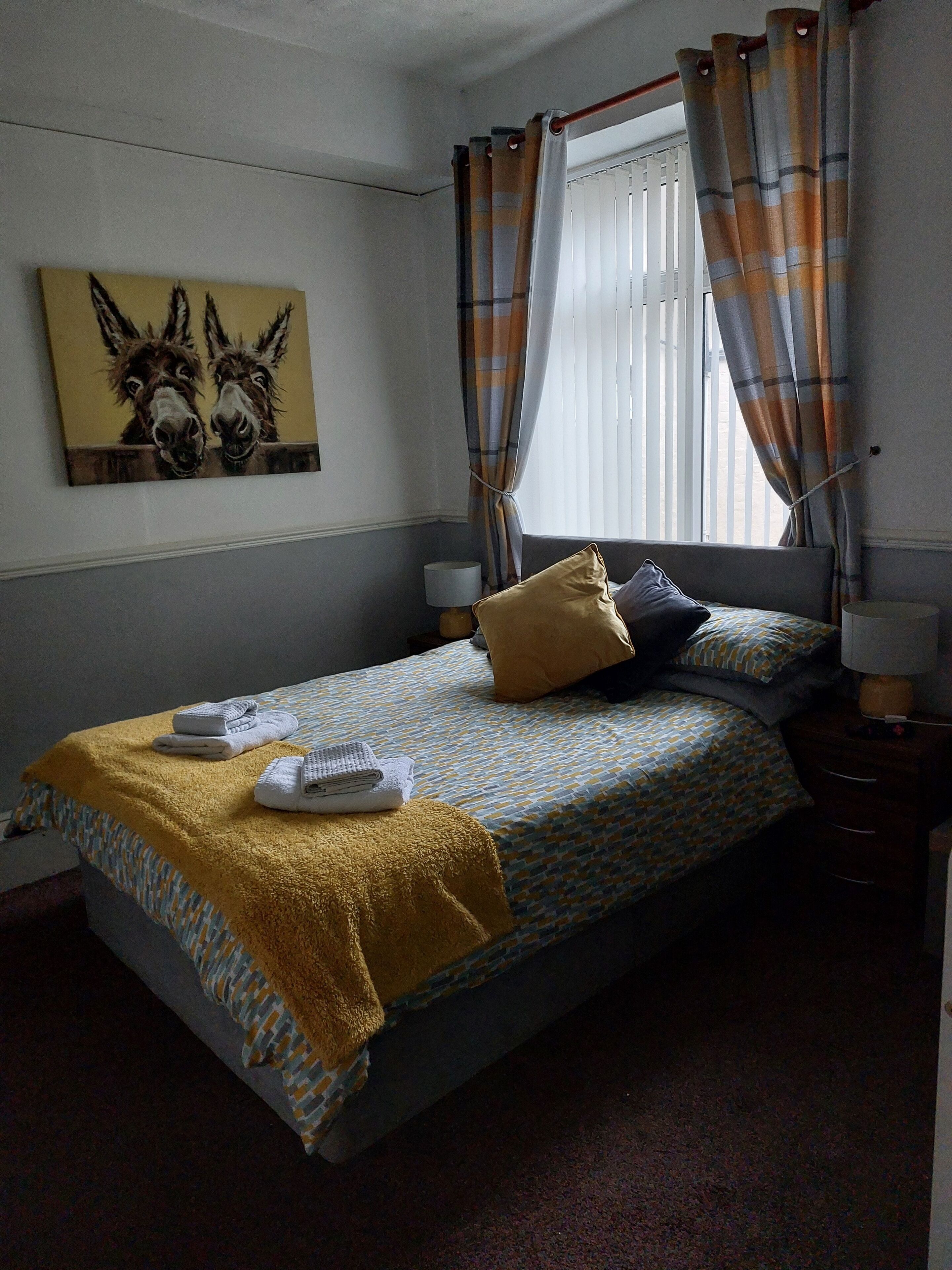 room 2 | laptop workspace, blackout curtains, iron/ironing board, travel cot