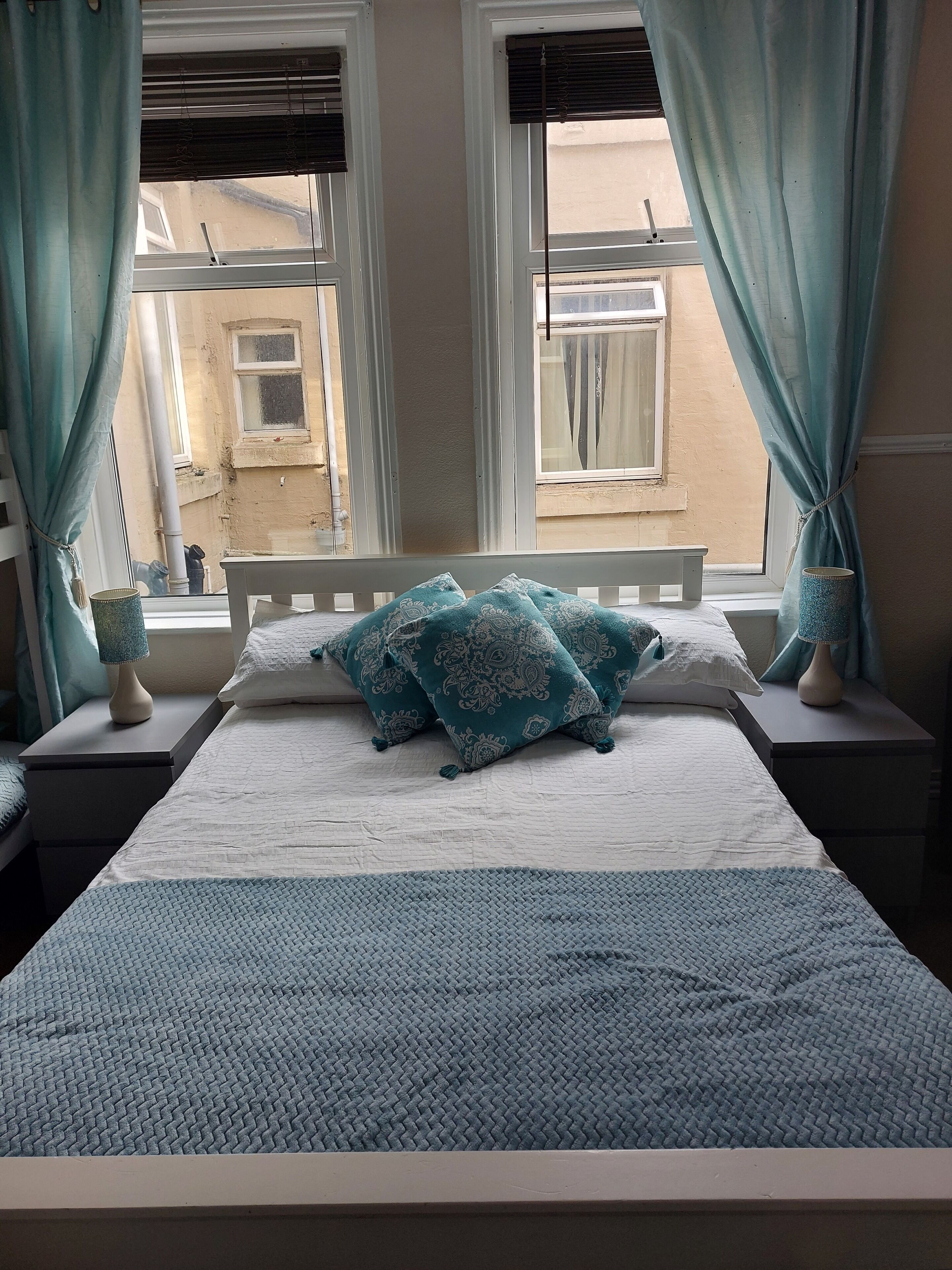 room 1 | laptop workspace, blackout curtains, iron/ironing board, travel cot