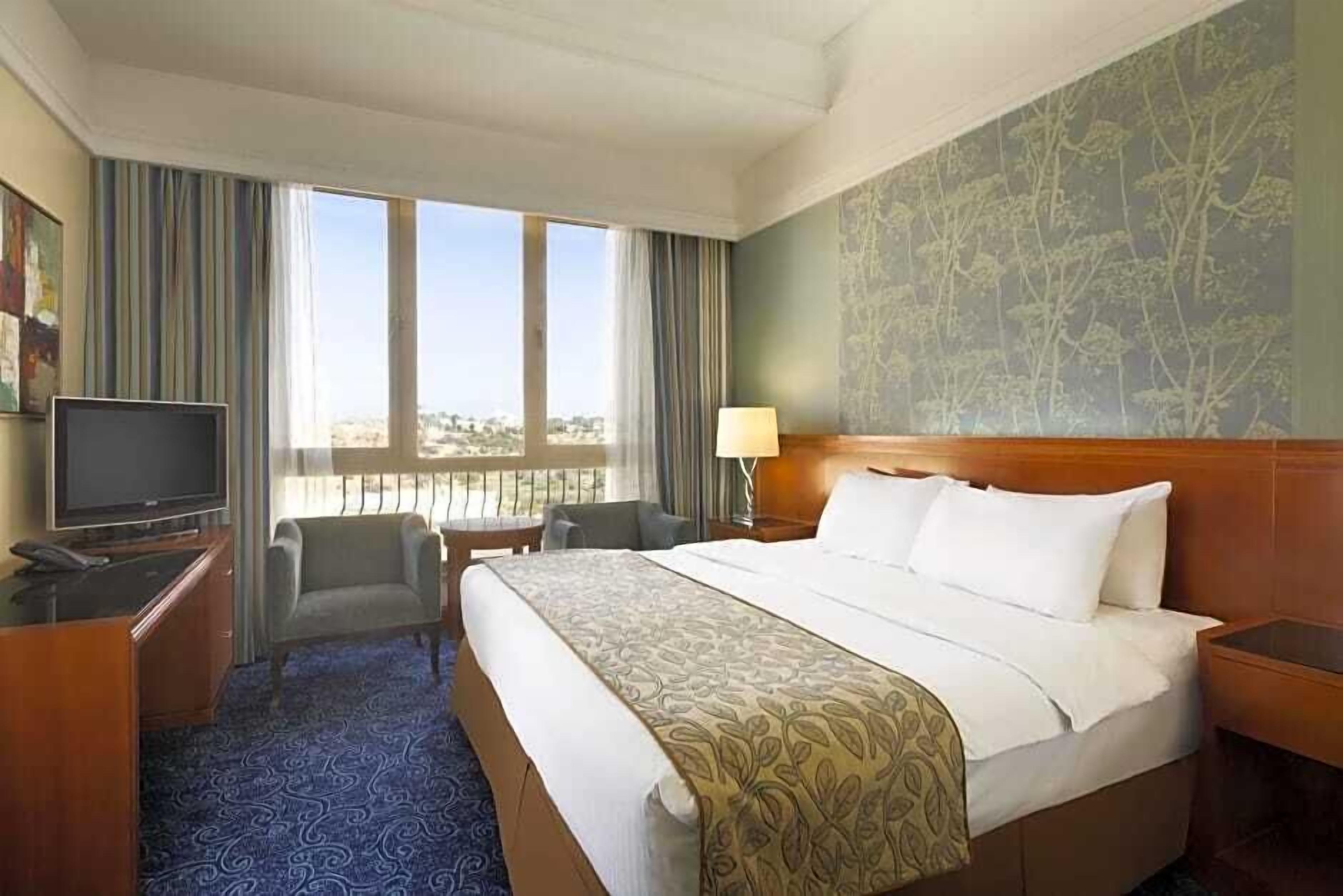 Egyptian cotton sheets, premium bedding, pillow-top beds, in-room safe