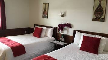 Premium bedding, free WiFi, bed sheets, alarm clocks