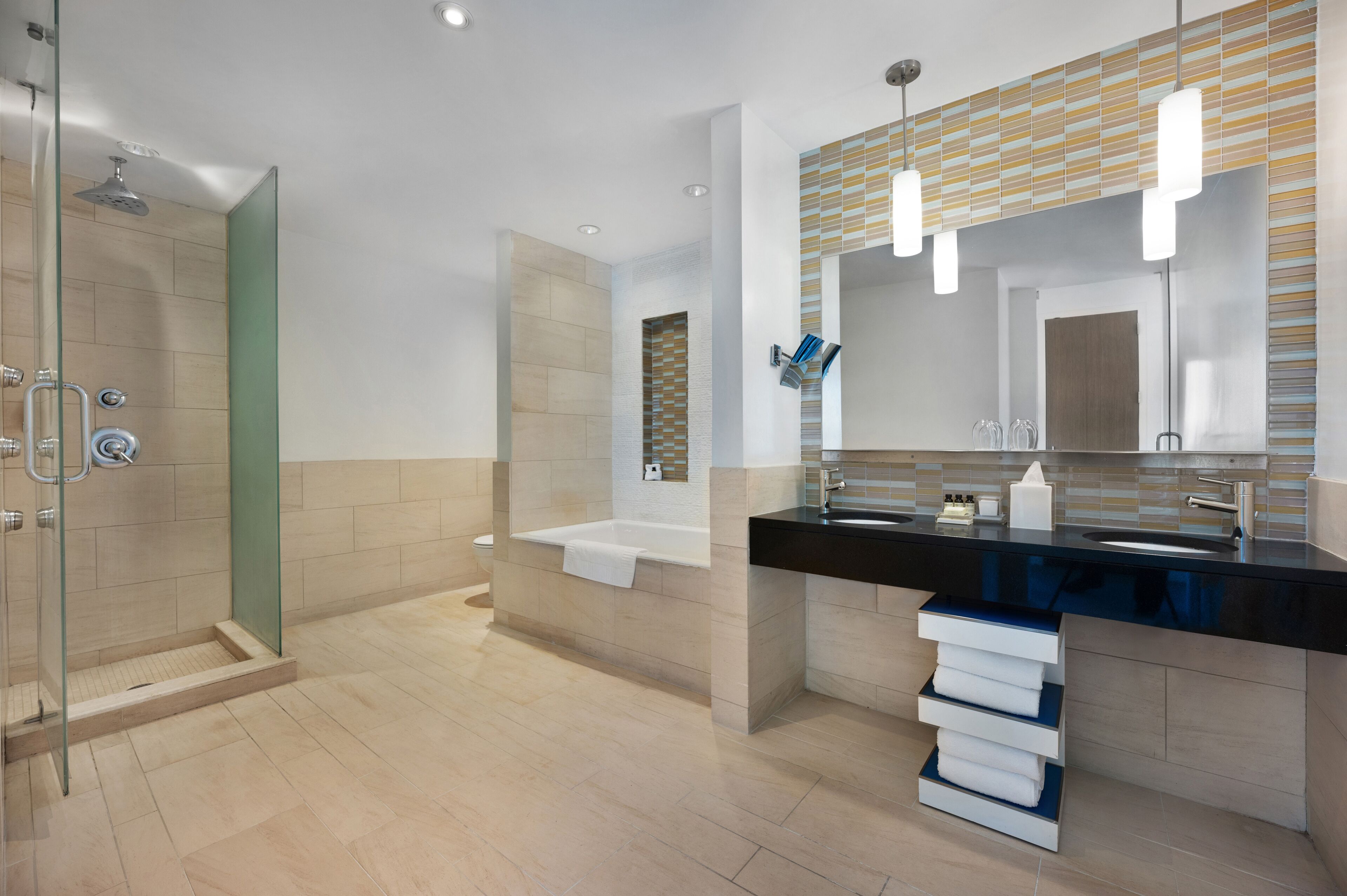 suite (hudson) | bathroom | shower, designer toiletries, hair dryer, bathrobes
