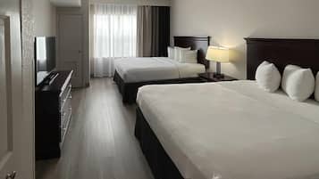 Suite, 1 slaapkamer, niet-roken | Een bureau, een strijkplank/strijkijzer, gratis babybedden, extra bedden