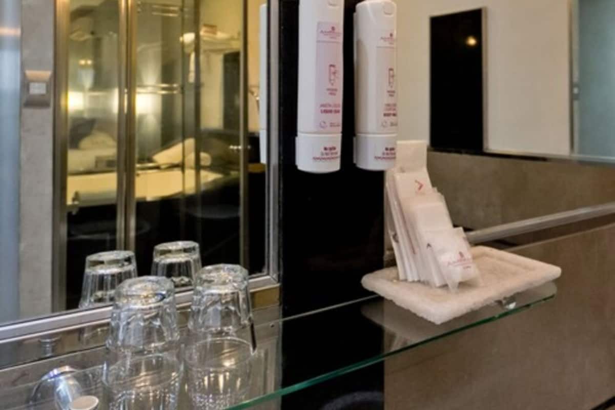 combined shower/bathtub, eco-friendly toiletries, hair dryer, bathrobes