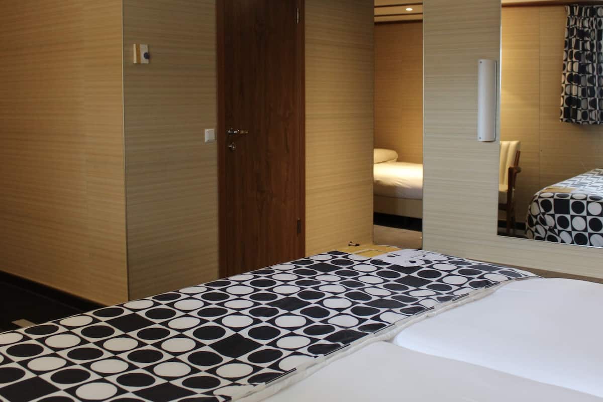 superior triple room | 1 bedroom, down duvets, in-room safe, desk