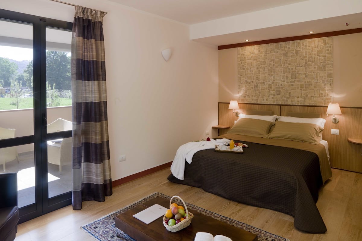 deluxe double room (spa access) | 1 bedroom, down duvets, in-room safe, blackout curtains