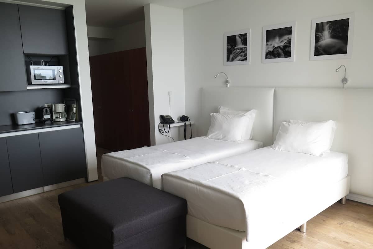 Panoramic Studio, 1 Bedroom, Kitchenette, Ocean View | 1 bedroom, in-room safe, desk, laptop workspace