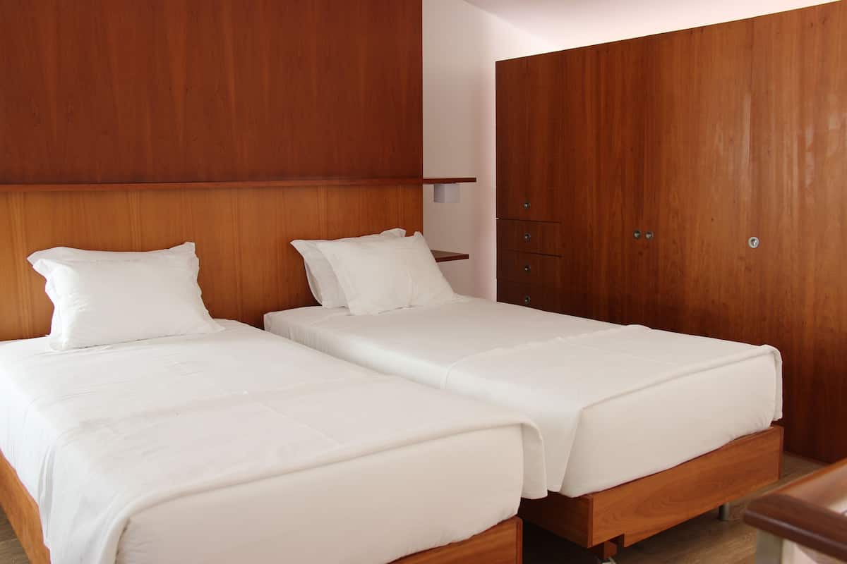 Comfort Duplex, 1 Bedroom, Partial Ocean View | 1 bedroom, in-room safe, desk, laptop workspace