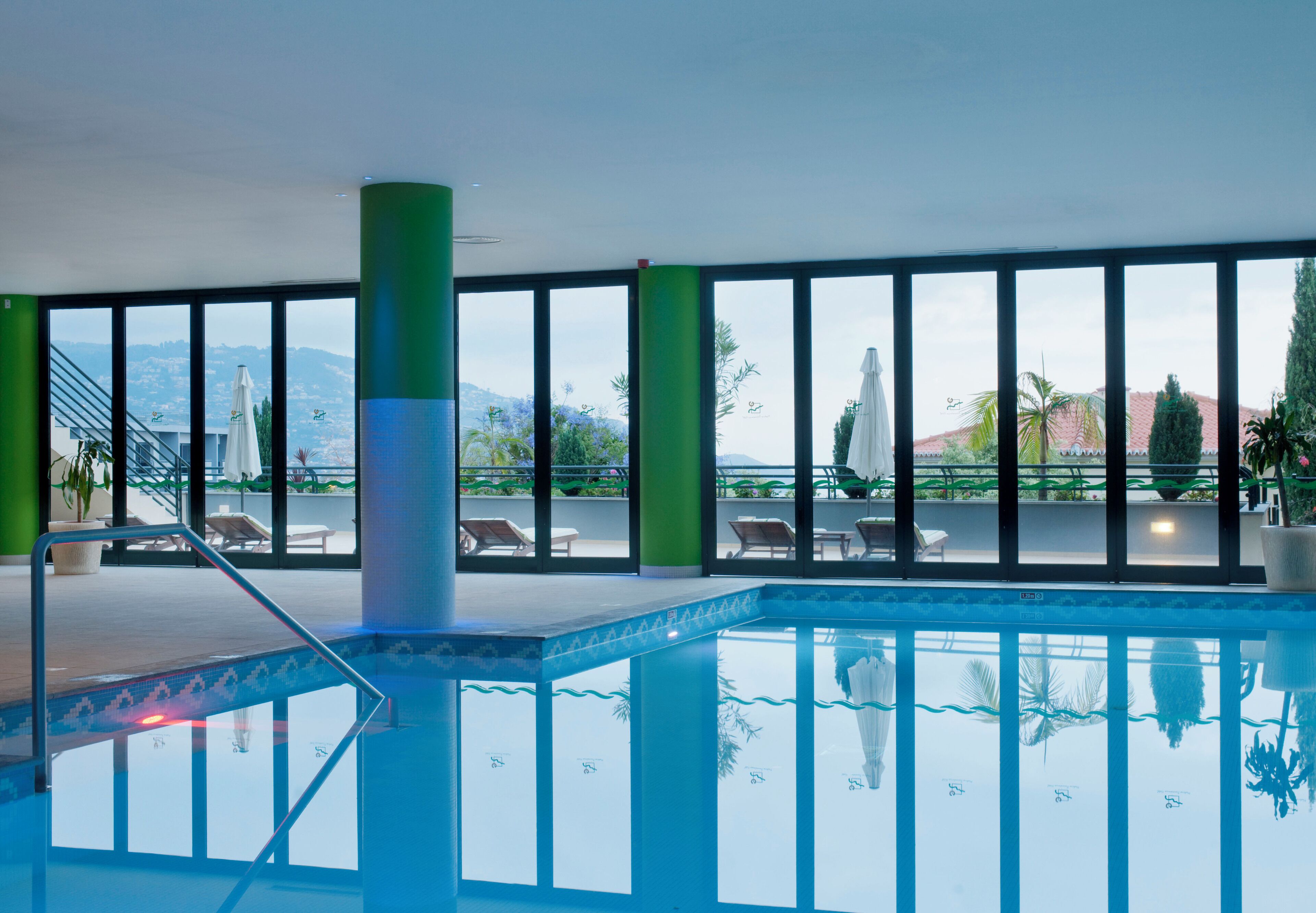 indoor pool, outdoor pool, open 9:00 am to 6:00 pm, pool umbrellas