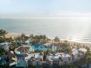A resort with a pool, beach, and ocean view. - Springfield at Sea Resort & Spa (Cha-am)