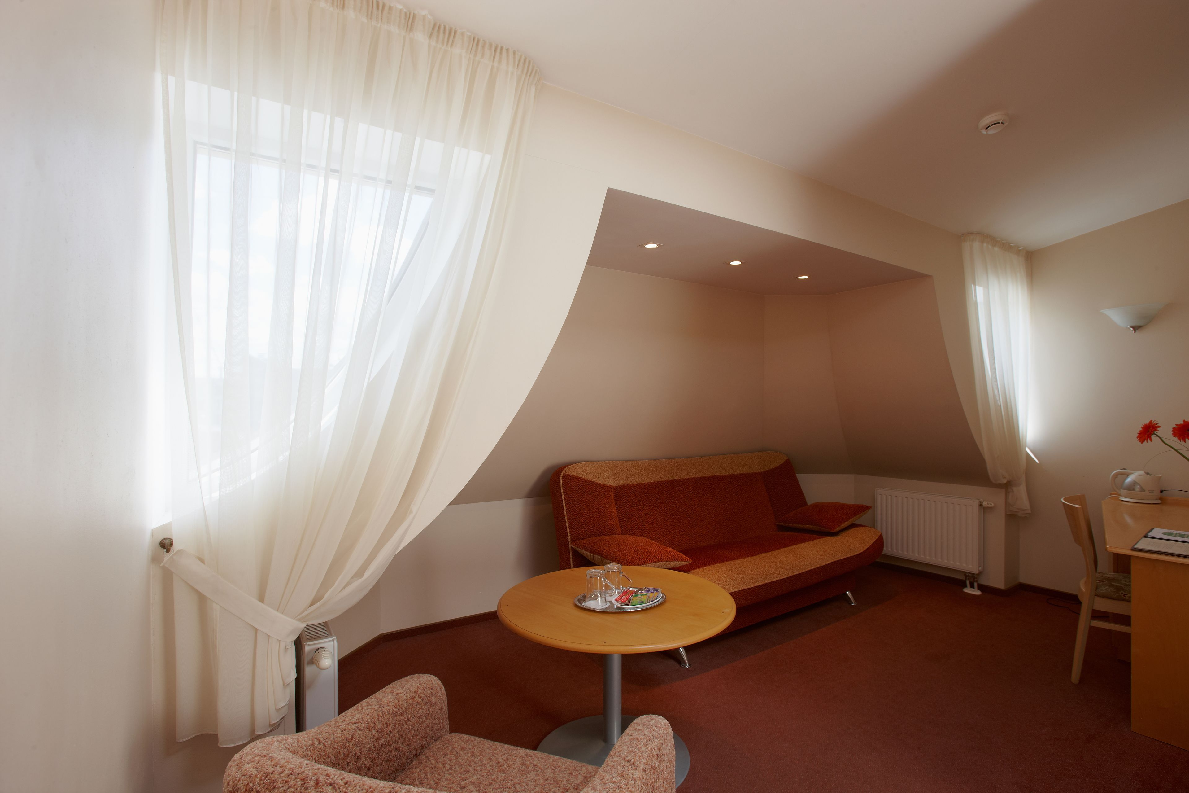 superior double or twin room | living area | tv