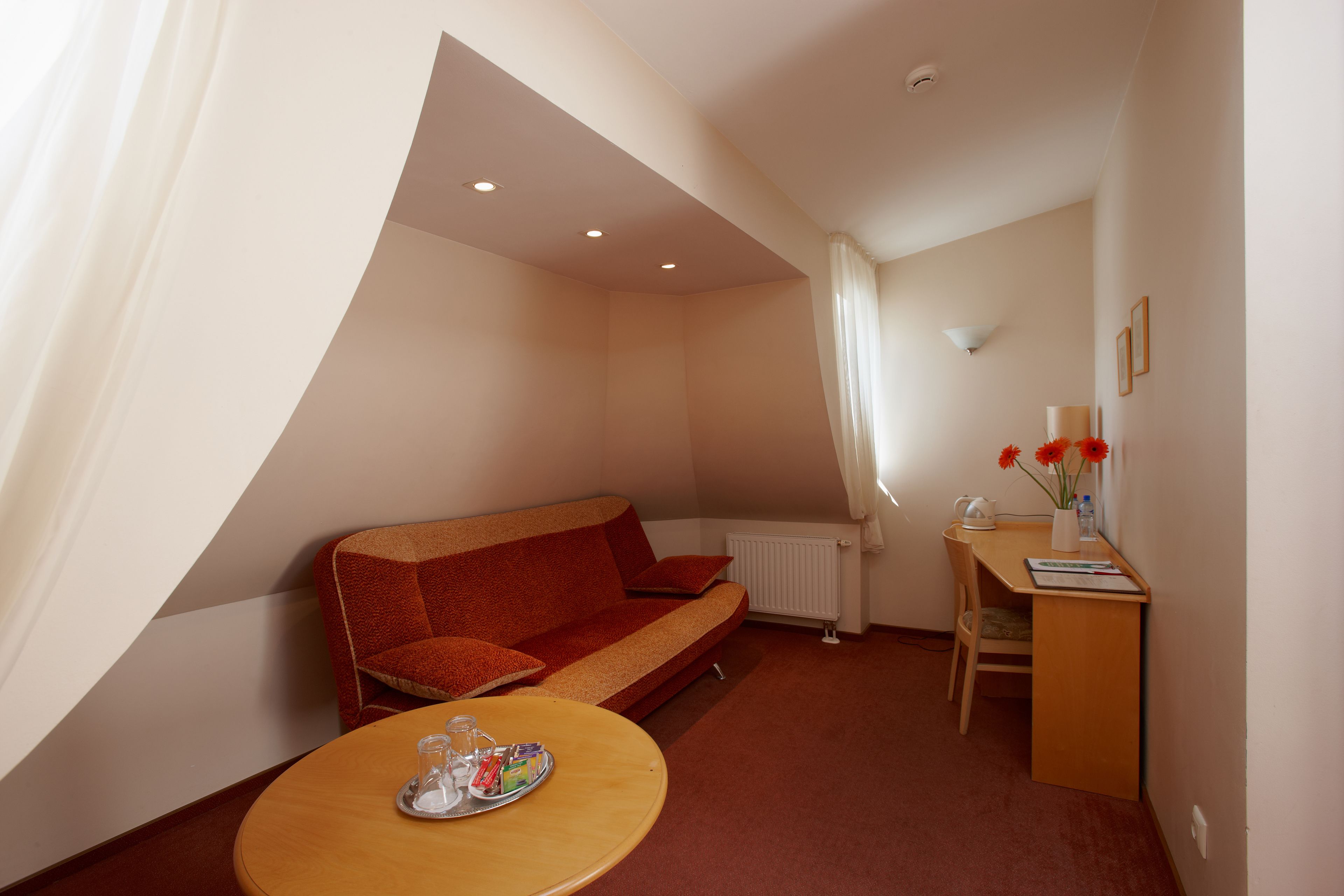 superior double or twin room | living area | tv