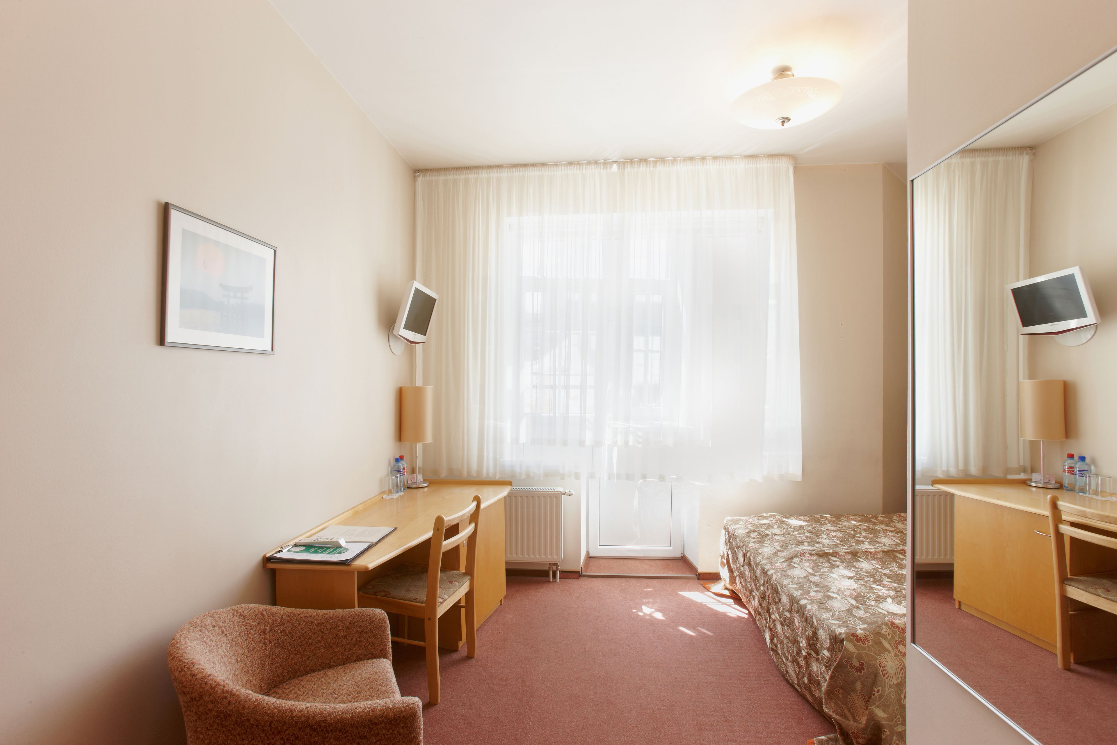 double or twin room | minibar, in-room safe, desk, soundproofing