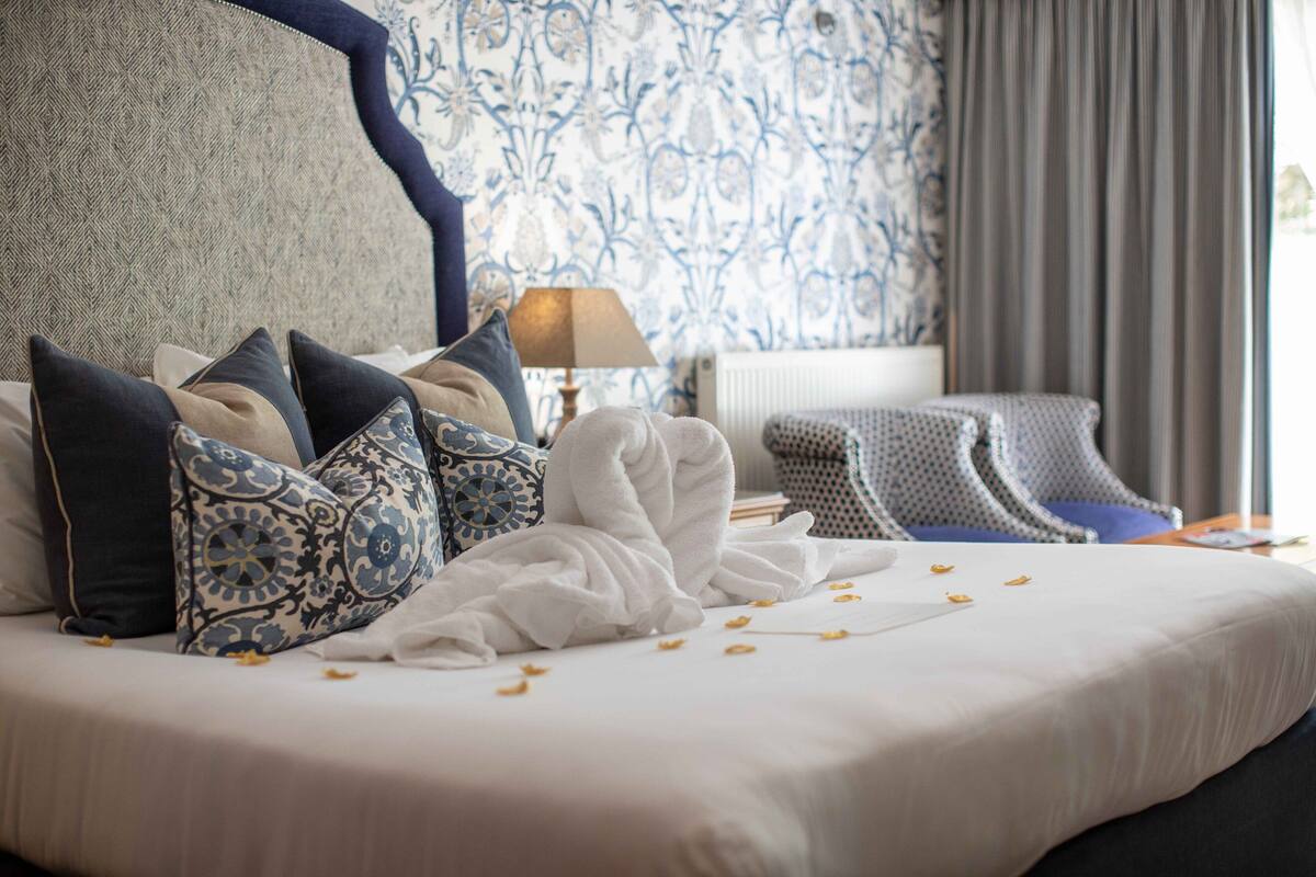 superior double room | 1 bedroom, laptop workspace, blackout curtains, iron/ironing board