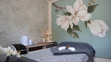 Sauna, hot tub, body treatments, hot stone massages