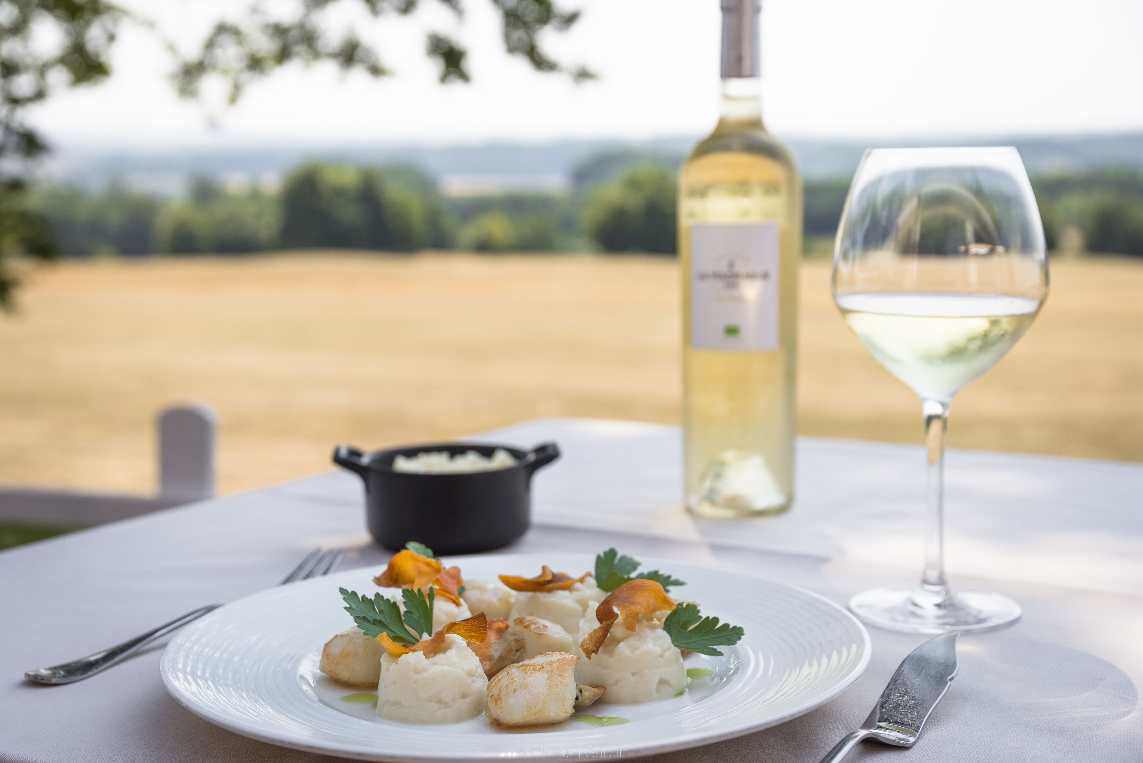 breakfast, lunch, dinner served; regional cuisine, golf course views