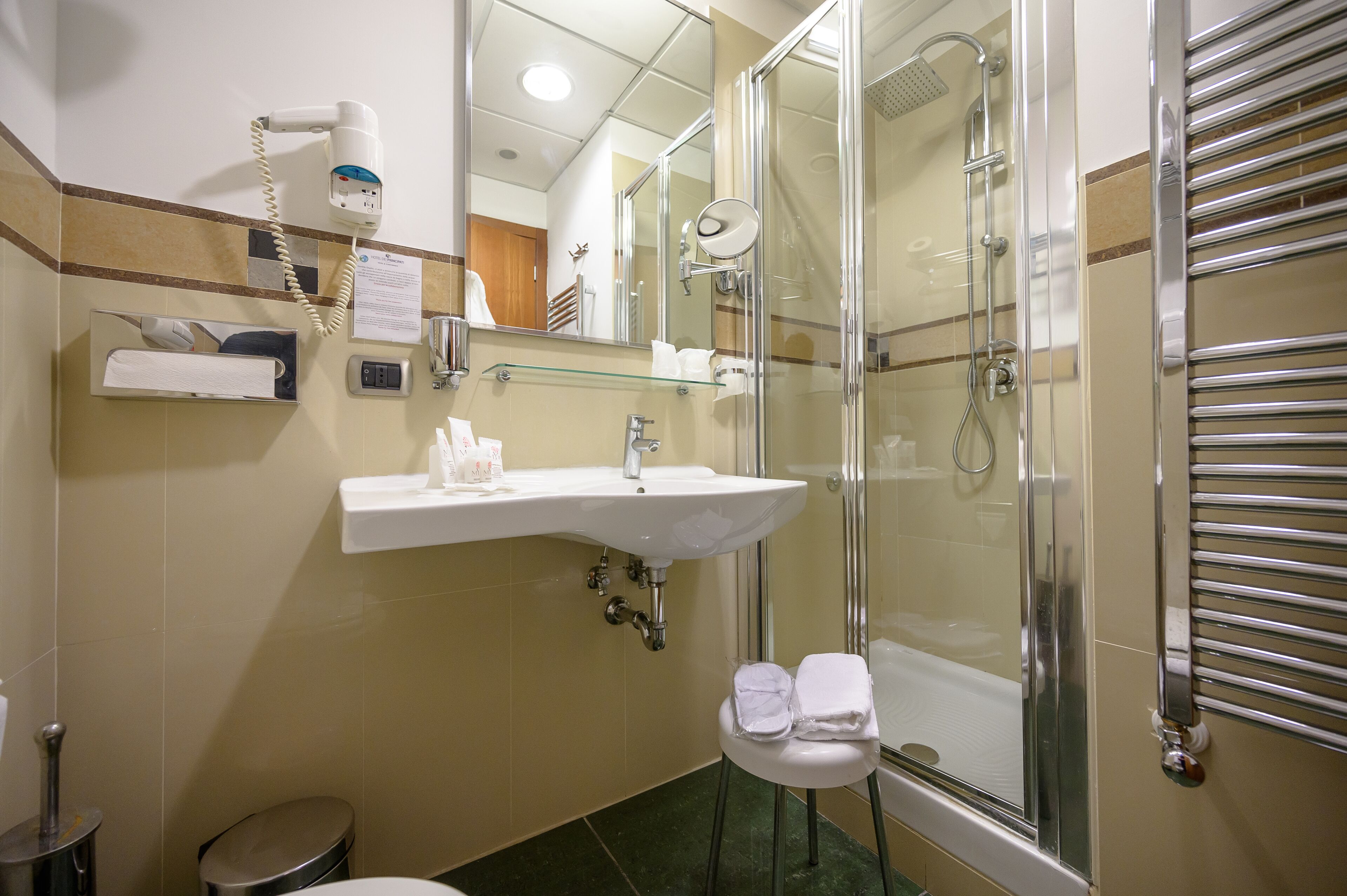 free toiletries, hair dryer, bidet, towels