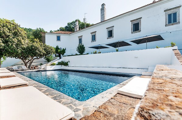 2 outdoor pools, pool umbrellas, pool loungers