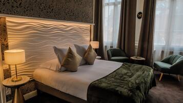 Chambre Triple Deluxe | Coffres-forts dans les chambres, fer et planche à repasser