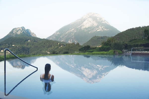 Indoor pool, seasonal outdoor pool, pool umbrellas, sun loungers