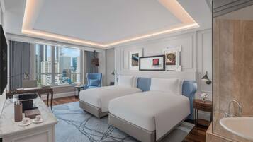 Premium bedding, down duvets, Select Comfort beds, minibar