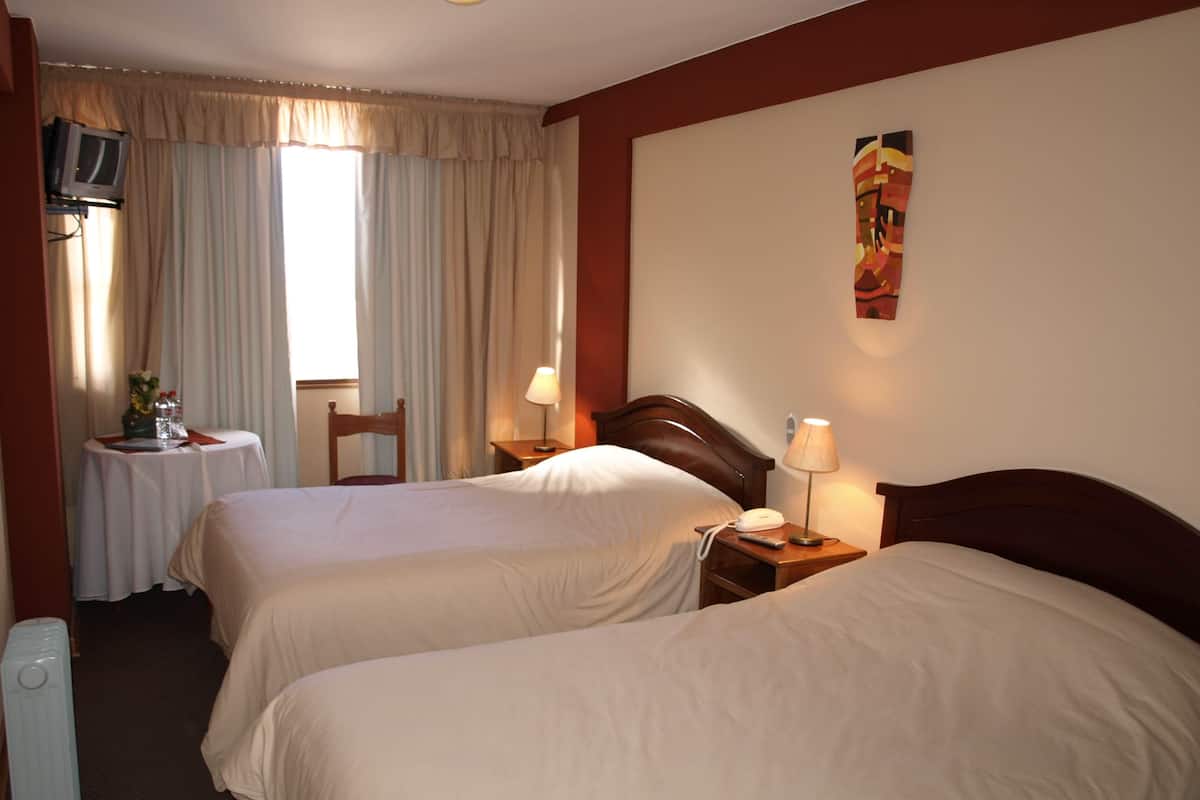 Premium bedding, down comforters, pillowtop beds, in-room safe