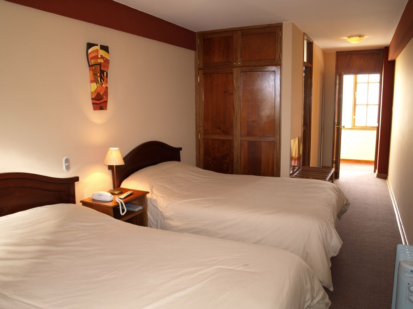 Premium bedding, down comforters, pillowtop beds, in-room safe