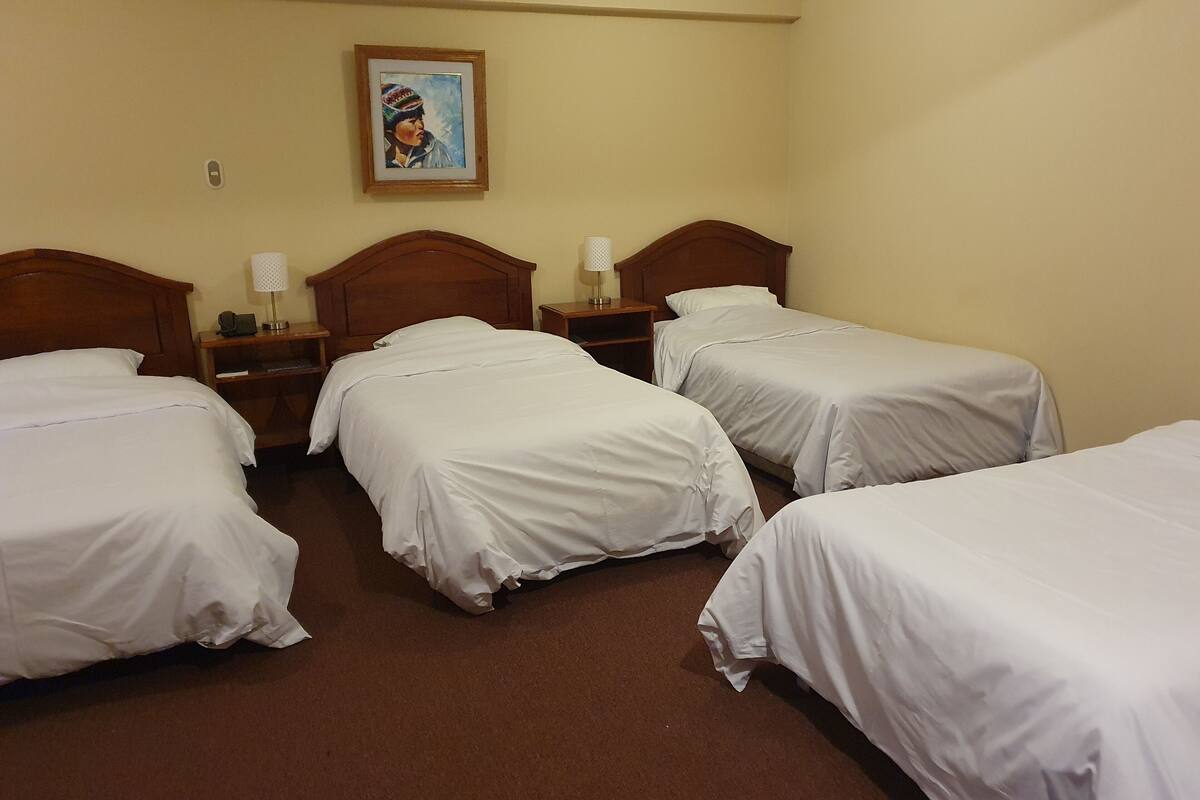 Standard Quadruple Room | Premium bedding, down duvets, pillow-top beds, in-room safe