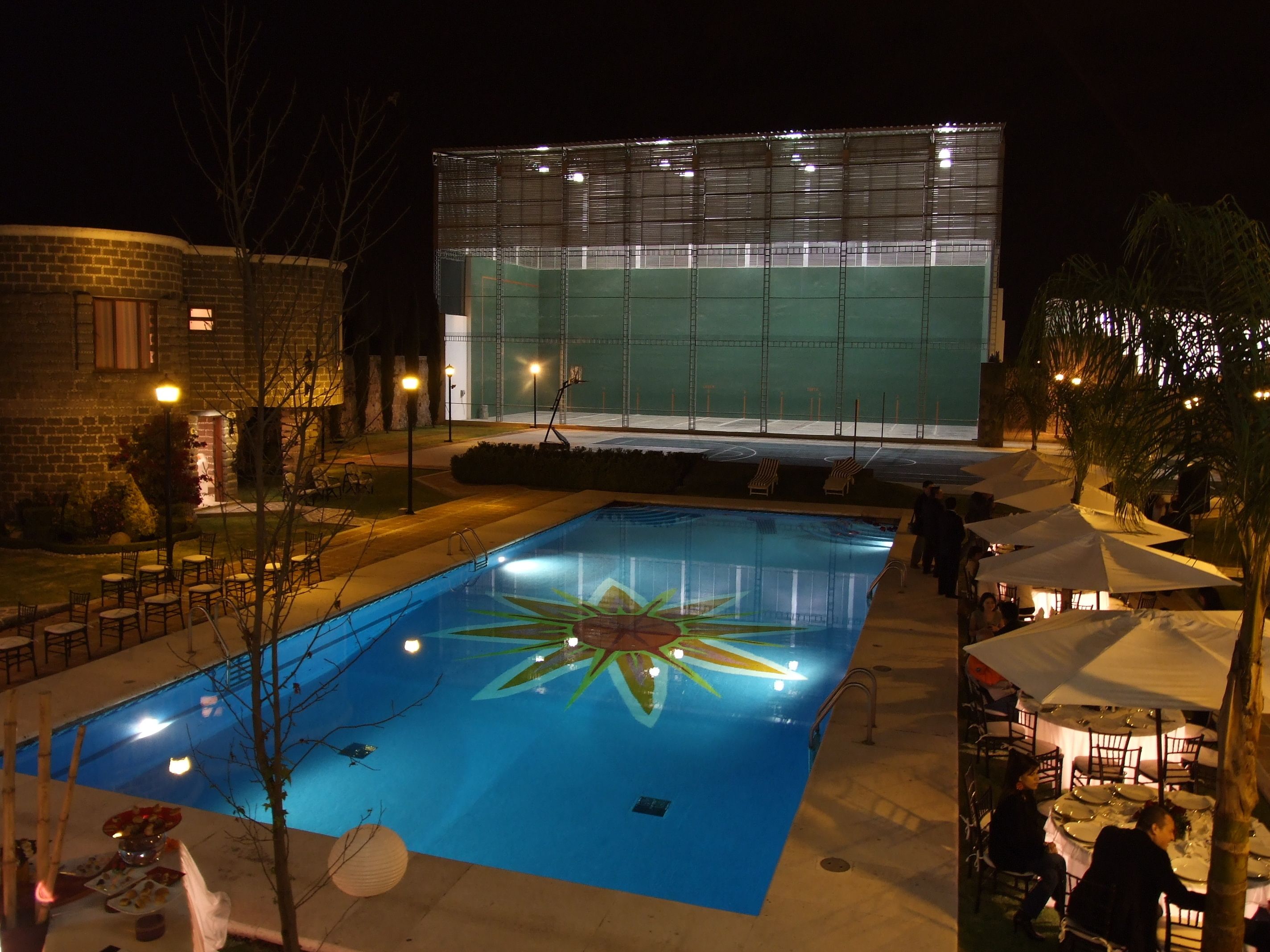 outdoor pool, pool umbrellas, pool loungers