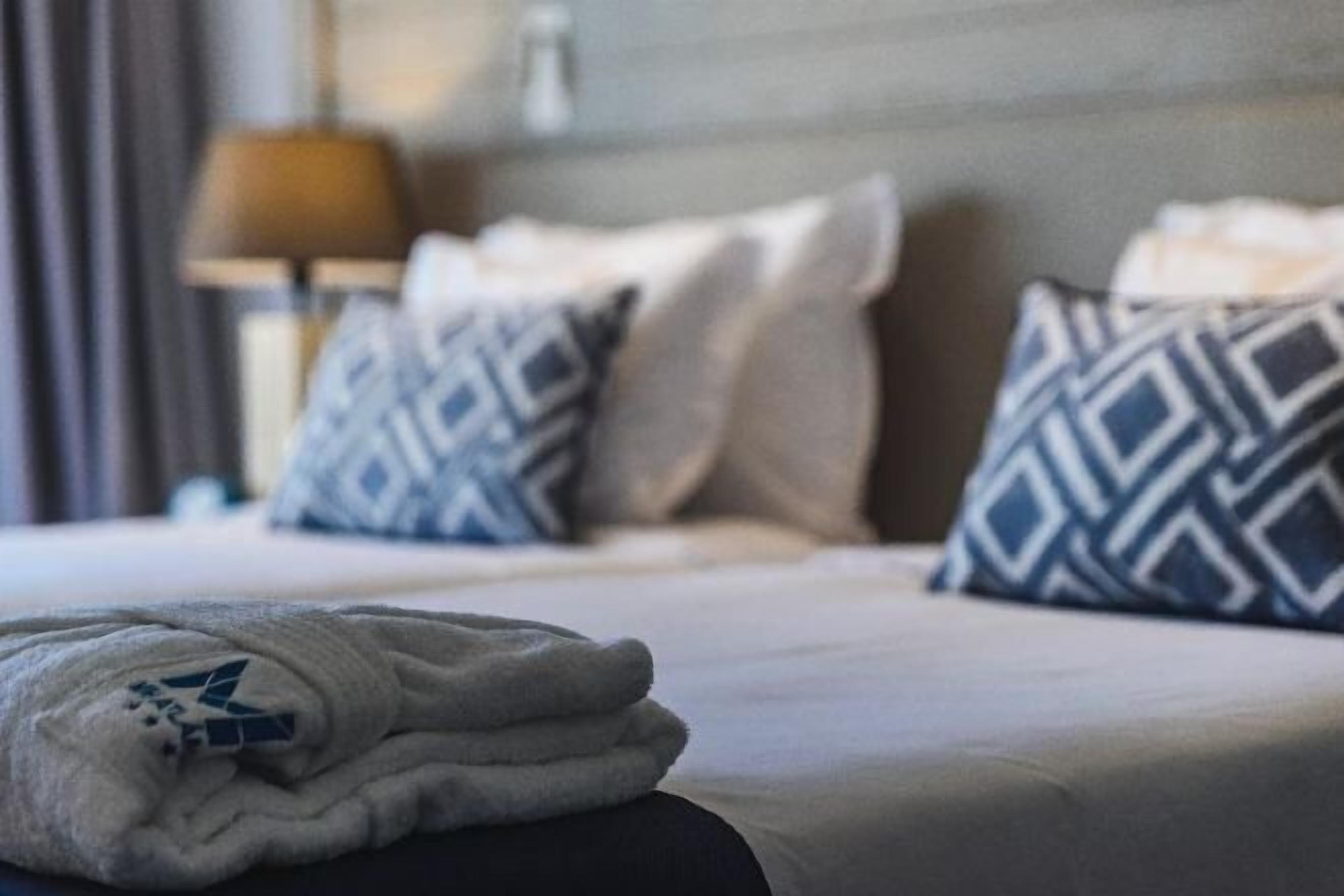 Ropa de cama hipoalergénica, edredón y minibar 